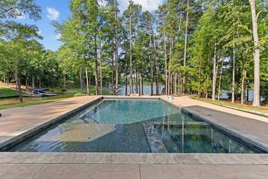 The Hearth is a waterfront home designed around the moments that - photo 44