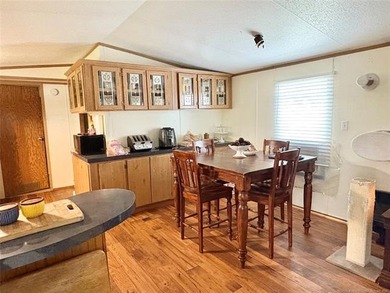 This clean and tidy 2 bed, 2 bath home is located in the highly - photo 8