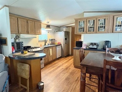 This clean and tidy 2 bed, 2 bath home is located in the highly - photo 9