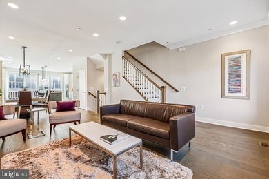 Welcome to this bright, luxury four-level townhome on a premier - photo 5