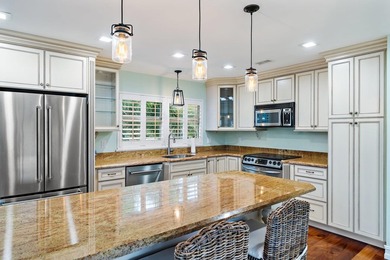 Walk to Beach! Nestled within the exclusive gated Jupiter Beach - photo 13