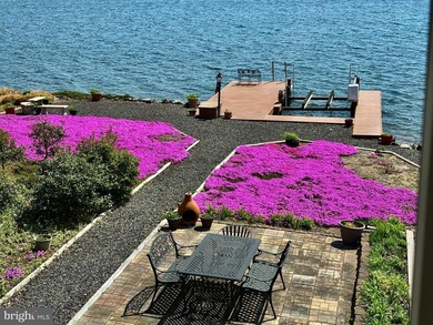 Welcome to 102 Flat Run, a stunning waterfront home that offers - photo 2