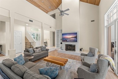 Set on an elevated corner homesite within Isleworth, this - photo 4