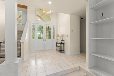 Set on an elevated corner homesite within Isleworth, this - photo 7