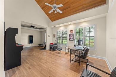 Set on an elevated corner homesite within Isleworth, this - photo 8