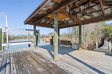 This exceptional waterfront home features 4 bedrooms and 4 - photo 2