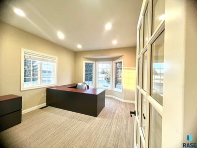Prime executive office opportunity overlooking the 18th green in - photo 13