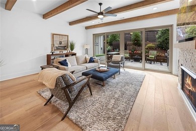 Tucked in the heart of Bridgemill, this luxury townhome lives - photo 8