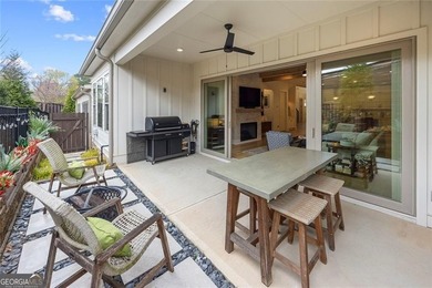 Tucked in the heart of Bridgemill, this luxury townhome lives - photo 9