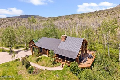 Tucked at the end of the road, this exceptional mountain estate - photo 7