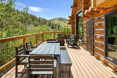 Tucked at the end of the road, this exceptional mountain estate - photo 9