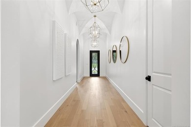 Perched within the prestigious Reflection Pointe community, this - photo 6