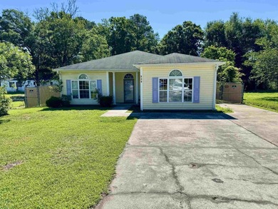Welcome to this affordable 4-bedroom, 2-bath home located in the - photo 1
