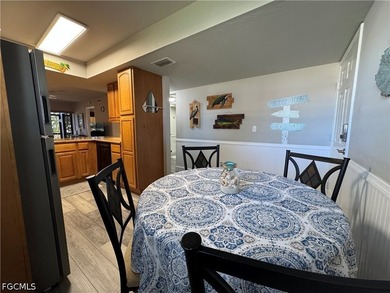 Located in the highly desirable Cape Coral Yacht Club area, this - photo 3