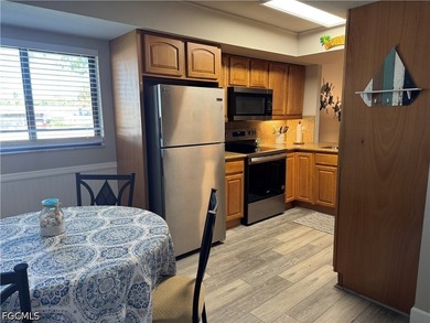 Located in the highly desirable Cape Coral Yacht Club area, this - photo 4