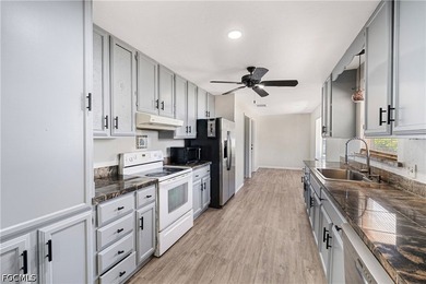 Welcome to this move in ready home in Golden Gate City offering - photo 5