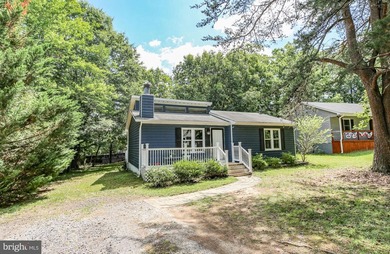 The perfect cottage at the lake is waiting for you.  This home - photo 2