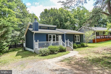The perfect cottage at the lake is waiting for you.  This home - photo 4