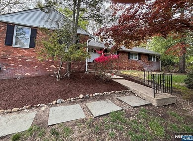 Welcome to this charming brick ranch, beautifully set on 1.58 - photo 2