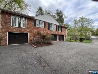 Welcome to this charming brick ranch, beautifully set on 1.58 - photo 3