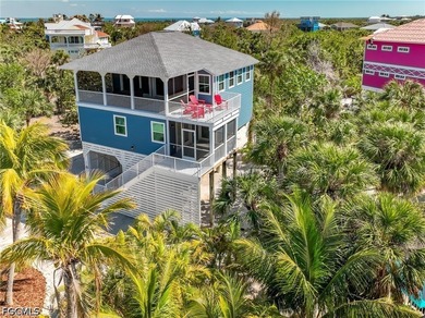 Exceptional Double-Lot Island Retreat! Ideally positioned on a - photo 4