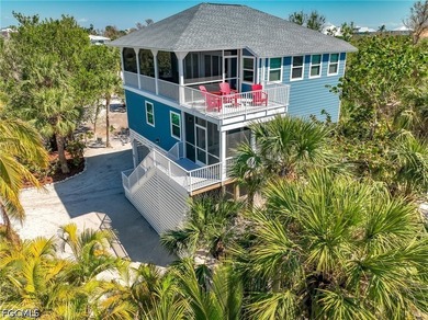 Exceptional Double-Lot Island Retreat! Ideally positioned on a - photo 5