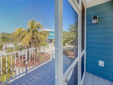 Exceptional Double-Lot Island Retreat! Ideally positioned on a - photo 6