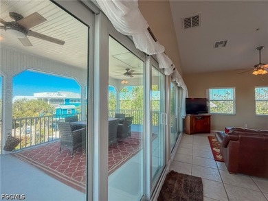 Exceptional Double-Lot Island Retreat! Ideally positioned on a - photo 9