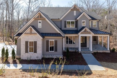 Lake Home For Sale in Flowery Branch, Georgia