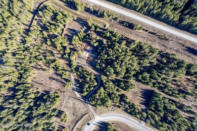 TO BE BUILT: Set on five private, lightly wooded acres in The - photo 18