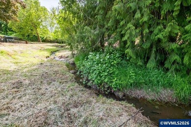 Bring your ideas to this 1.6 acre private lot on the outskirts - photo 35