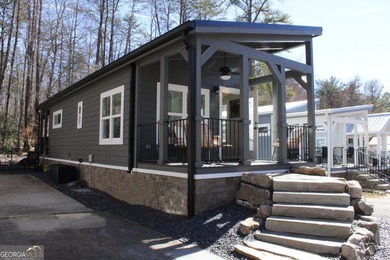Experience the charm of tiny living in this light and airy 2024 - photo 1