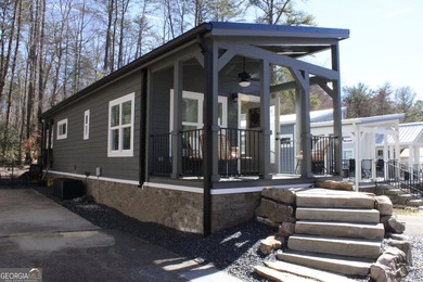 Experience the charm of tiny living in this light and airy 2024 - photo 2