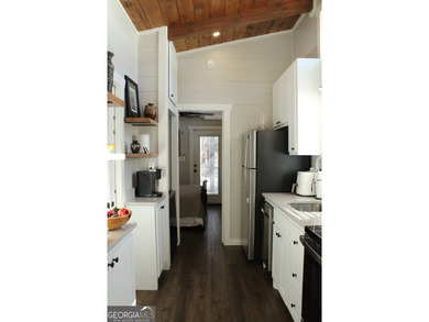 Experience the charm of tiny living in this light and airy 2024 - photo 8