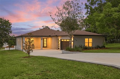 Welcome to this stunning BRAND-NEW CUSTOM-BUILT home in the - photo 3