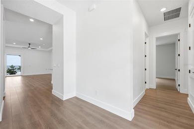 Welcome to this stunning BRAND-NEW CUSTOM-BUILT home in the - photo 8