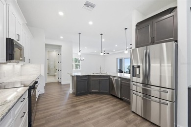 Welcome to this stunning BRAND-NEW CUSTOM-BUILT home in the - photo 10