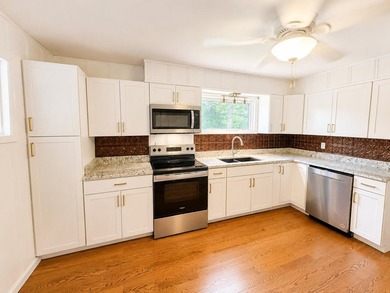 Welcome to this updated 3-bedroom, 2-bath home offering - photo 8