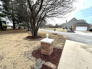 Spacious All Brick Ranch Home with a 3 Car Garage in the Heart