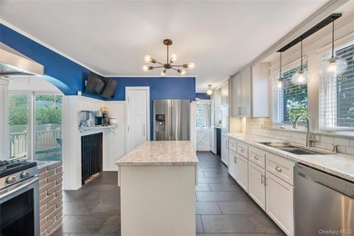Timeless Colonial Charm with a beautifully updated 3-bedroom, 1 - photo 9