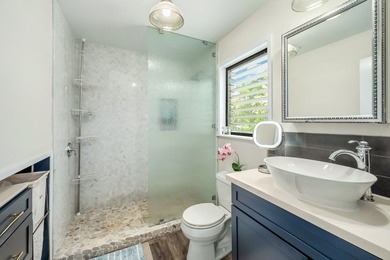 Nestled in the heart of Kilauea, this thoughtfully designed and - photo 14