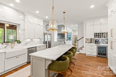 From the oversized Mahogany front doors to the designer-curated - photo 15