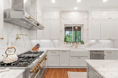 From the oversized Mahogany front doors to the designer-curated - photo 16