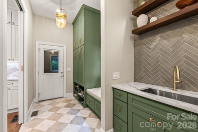 From the oversized Mahogany front doors to the designer-curated - photo 19