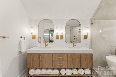 From the oversized Mahogany front doors to the designer-curated - photo 25
