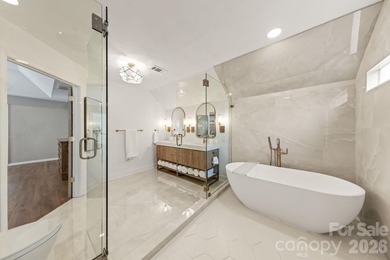 From the oversized Mahogany front doors to the designer-curated - photo 26