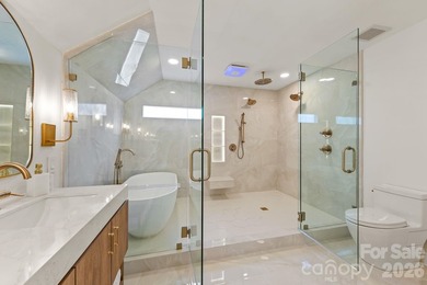 From the oversized Mahogany front doors to the designer-curated - photo 27
