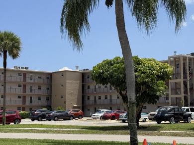 Lake Condo For Sale in Palm Springs, Florida