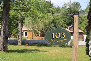 Welcome to 103 Seven Oaks Road! Nestled on a private corner lot - photo 2