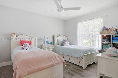 Discover your own private oasis in the heart of Weston! Situated - photo 30
